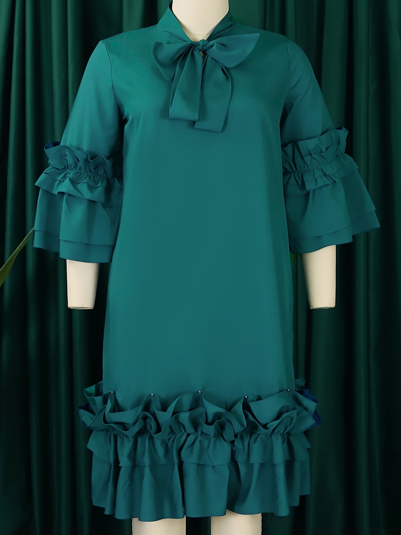 Robe à volants et manches évasées grande taille .