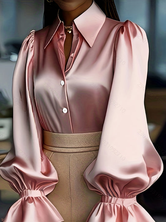 Chemise élégante et pleine de tempérament en satin et crêpe satinée à manches lanternes bouffantes.