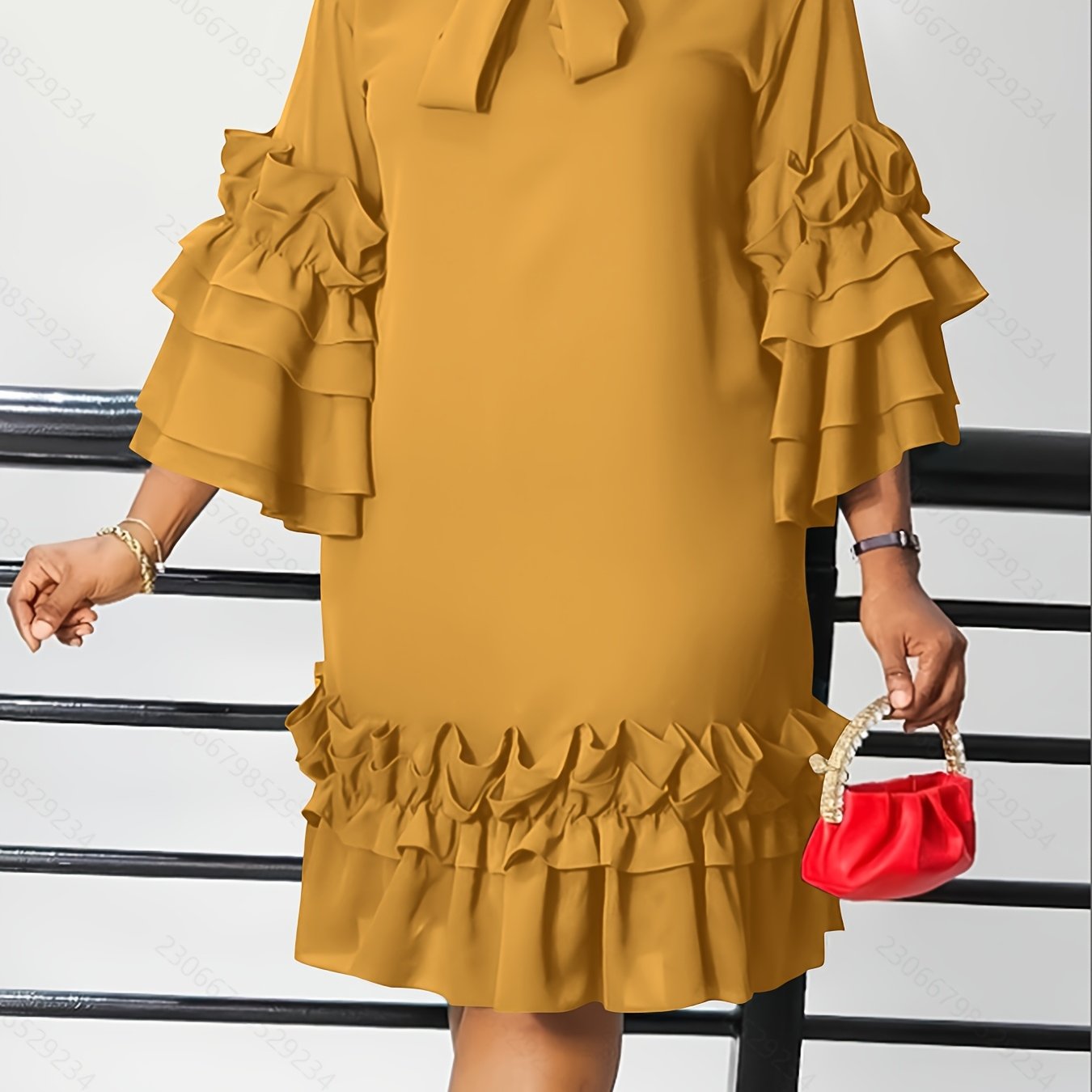 Robe à volants et manches évasées grande taille .