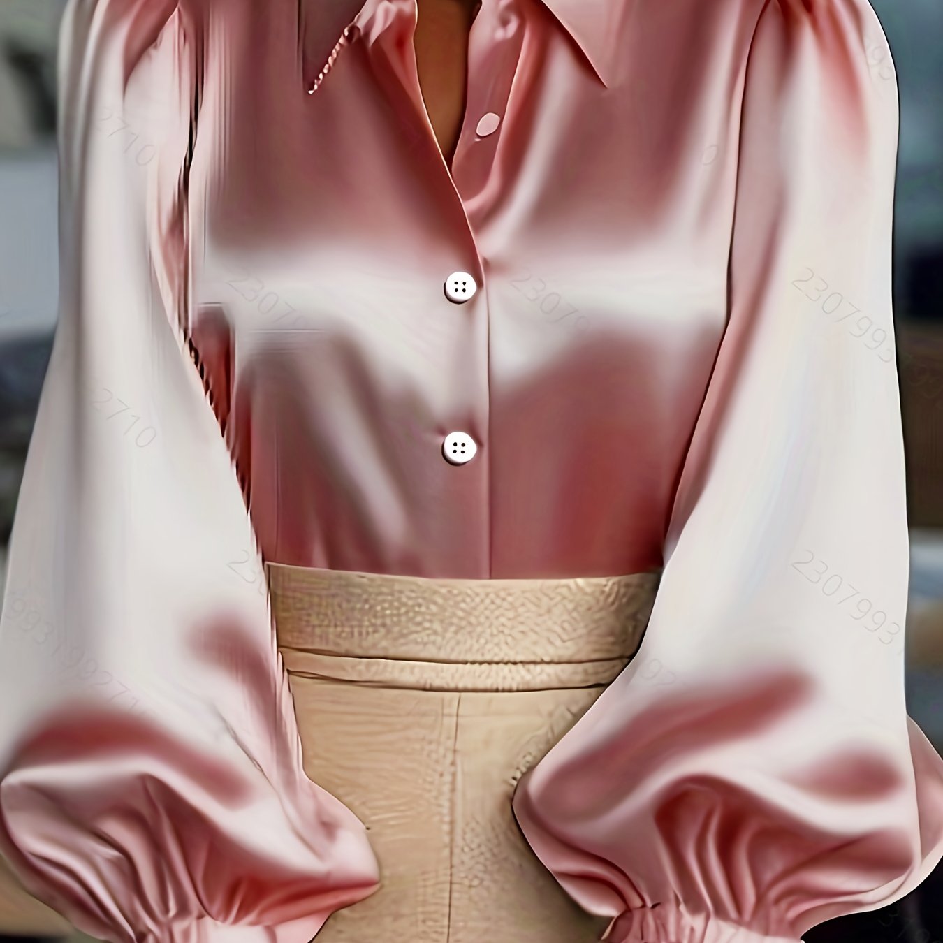 Chemise élégante et pleine de tempérament en satin et crêpe satinée à manches lanternes bouffantes.