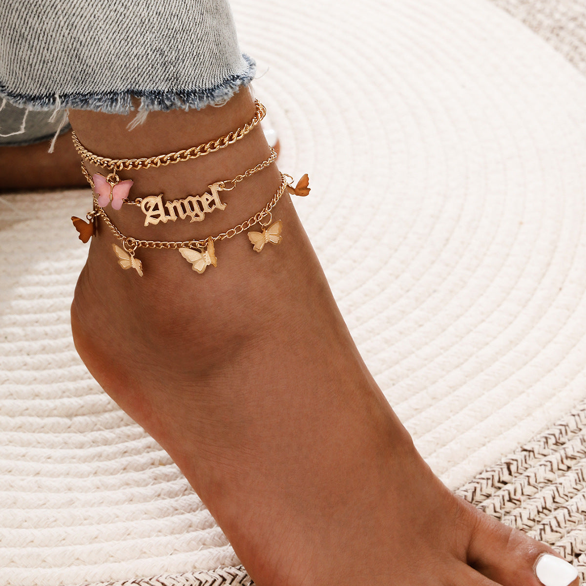 Ensemble de 4 pièces de bracelets de cheville en coquillage pour femmes.
