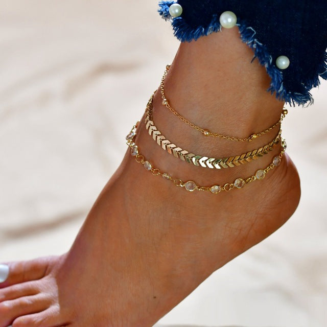 Ensemble de 4 pièces de bracelets de cheville en coquillage pour femmes.