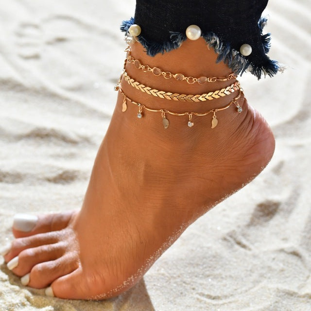 Ensemble de 4 pièces de bracelets de cheville en coquillage pour femmes.