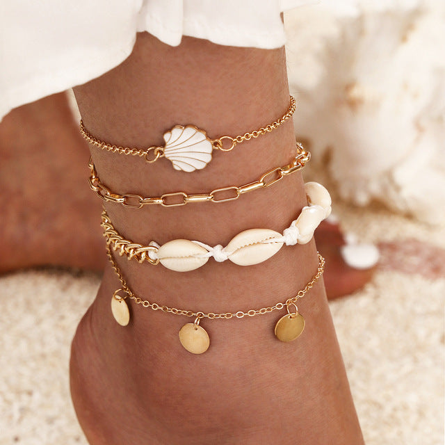 Ensemble de 4 pièces de bracelets de cheville en coquillage pour femmes.